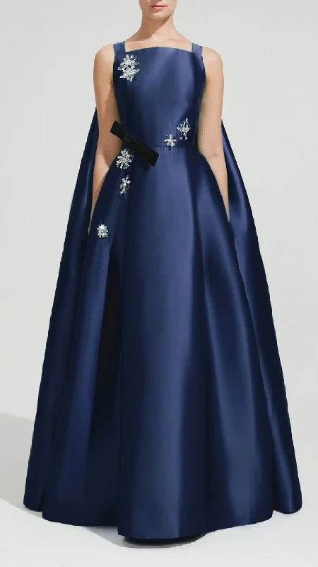 Cape style gown with crystal embellishments